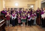 Sanz impone las tradicionales becas de residente a los 12 nuevos niños de San Ildefonso