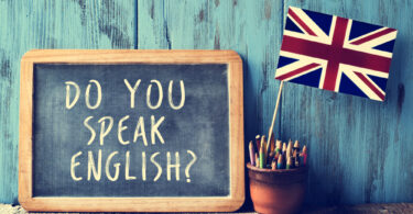 text do you speak english? in a chalkboard, filtered